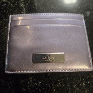 kate spade metallic lavender card wallet with logo plaque